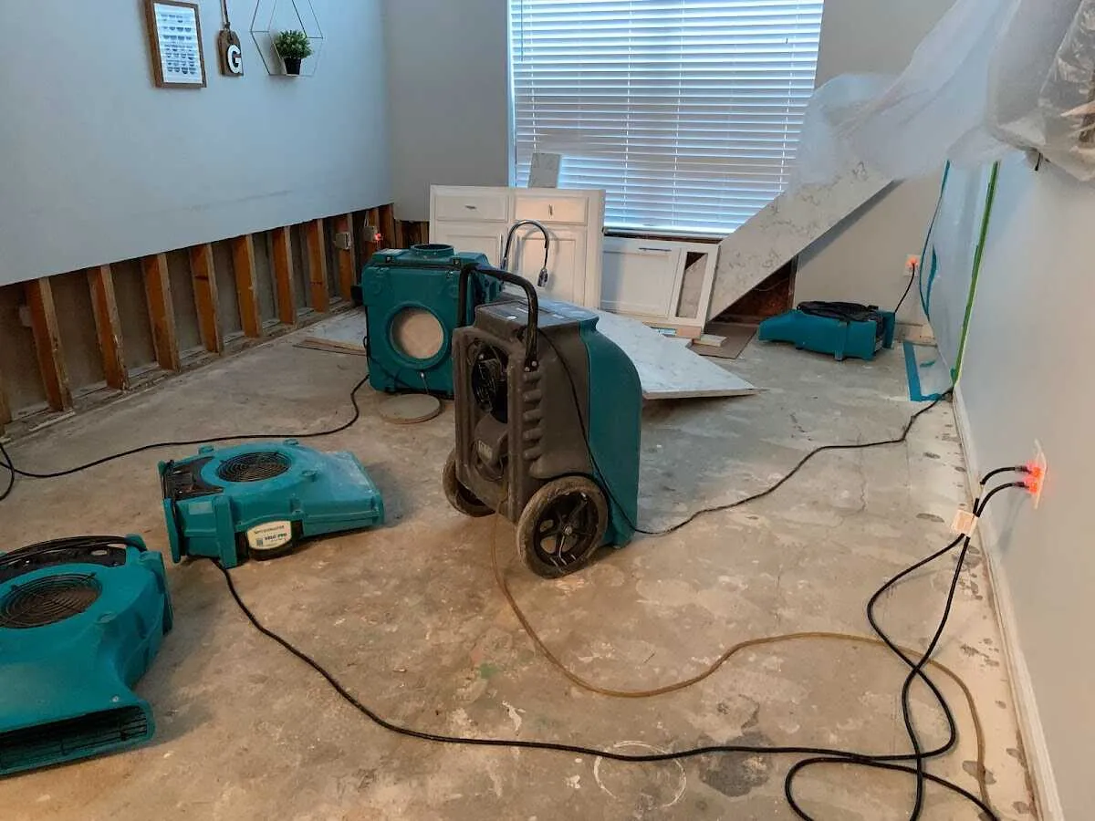 Dehumidifier in flood-cut room for Water Damage Restoration in Raceland